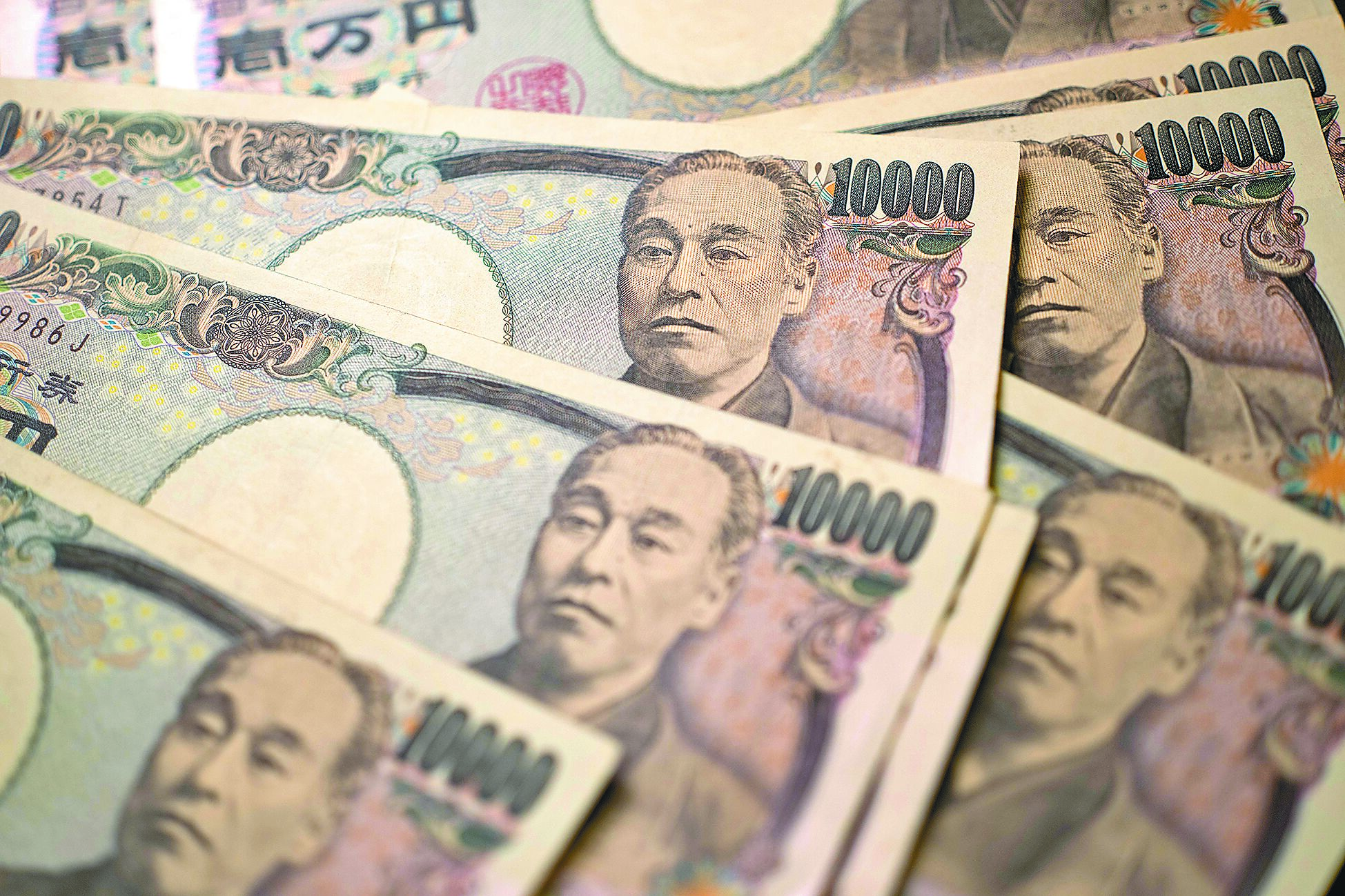 日銀結束負利率,對愛去日本旅遊的人,最想問就是:日圓是不是要升值了?圖為日圓示意圖。(新華社) image