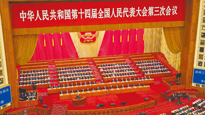 大陸國務院總理李強5日進行2025年政府工作報告,今年將GDP成長目標定為5%左右、連續3年持平。(藍孝威攝) image