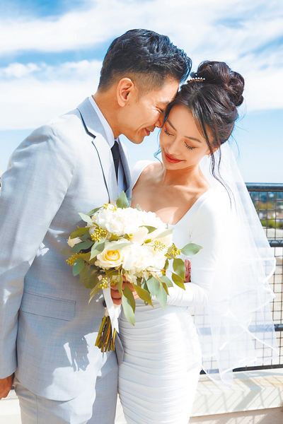 孔令奇(左)與Eunice已於去年登記結婚。(孔令奇提供) image