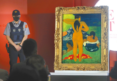 故宮百年院慶「從印象派到現代主義—美國大都會博物館名作展」4日舉行開箱記者會,正式對外公布重要展品高更的《大溪地的出浴女子》。(陳君瑋攝) image