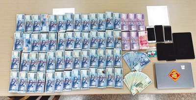 詐團藏身宜蘭民宿被查獲,查扣現金新台幣逾628萬元。(刑事局南部打擊犯罪中心提供/洪靖宜高雄傳真) image