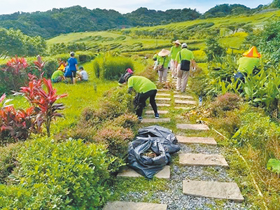 基隆市環保局推動空氣品質淨化區補植計畫,也力邀企業及民間團體共同協力認養,共同提升基隆市空氣品質。(基隆市政府提供/張志康基隆傳真) image