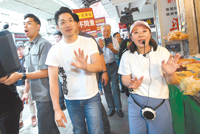 台北市長蔣萬安(中)20日要求政府依法盡速發給1萬元現金。(黃世麒攝) image