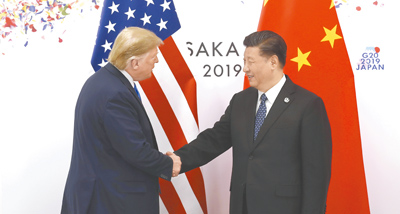 媒體報導,美國總統川普有可能在APEC峰會前訪問中國。圖為2019年6月29日,中國國家主席習近平在日本大阪會晤川普。(中新社) image
