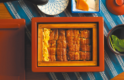 鰻魚名店小倉屋於8月24日前舉辦「2025土用丑盛夏鰻魚祭」,即日起至7月31日的土用丑之日於光復本店推出「鰻蒸竹定食」(見圖)便當外帶買一送一活動。(小倉屋提供) image