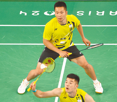 2024巴黎奧運羽球男子雙打金牌戰,中華隊李洋(後)、王齊麟(前)黃金組合。(本報資料照片) image