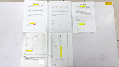 刑事局破獲吳姓男子為首的融資公司,以假車貸、真房貸方式,誘騙詐欺被害人抵押房產借款,再讓詐團剝一層皮。警方逮捕吳嫌等26人,查扣貸款合約等證物。(刑事局提供/胡欣男台北傳真) image
