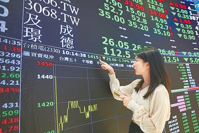 9月台股指數飆高,交易量放大,9月證交稅收312億元,創歷史第3高。(鄧博仁攝) image