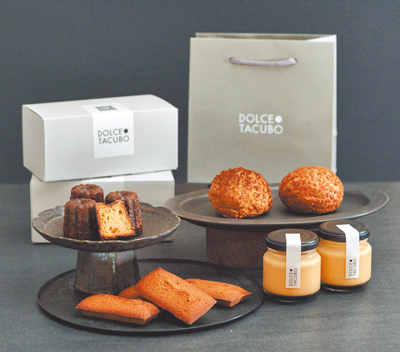 東京代官山排隊甜點名店「DOLCE TACUBO」來台客座,帶來現烤費南雪、法式可麗露、焦糖布丁、卡士達泡芙迎饕客。(台北晶華酒店提供) image