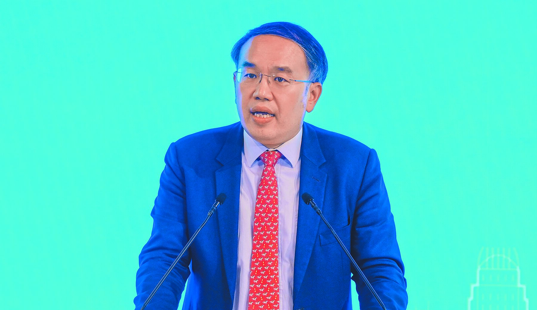 香港特區政府財經事務及庫務局局長許正宇指出,穩定幣有助降低跨境支付成本,不存在投機炒作空間。(中新社) image