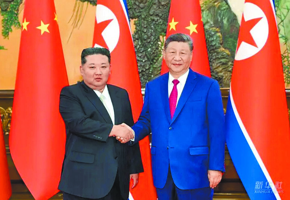 中共中央總書記習近平4日在北京人民大會堂,與北韓領導人金正恩舉行會談。(新華社) image