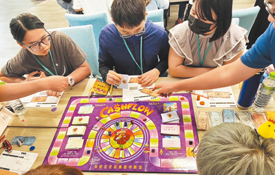 台中市府創新推出理財單身聯誼活動,透過現金流桌遊互動體驗,配對率破7成。(台中市府提供/陳淑娥台中傳真) image