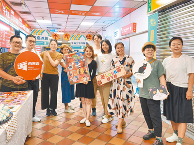 嘉義市西市場新舊店家匯聚,推出「西市抬槓」活動由專人導覽走讀西市場新風情。(廖素慧攝) image
