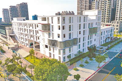 新北市淡海國小新建校舍外觀明亮、空間寬敞。(新北市教育局提供/李育嫺新北傳真) image