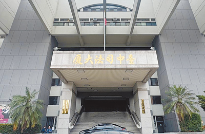 台中地院國民法庭審理謝女潑汽油燒死李姓男友案,27日依殺人罪判14年。(本報資料照片) image